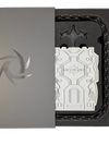 BeyBling gift packaging with a gray swirl-logo box lid beside a black foam tray holding an embossed white BeyBling insert card